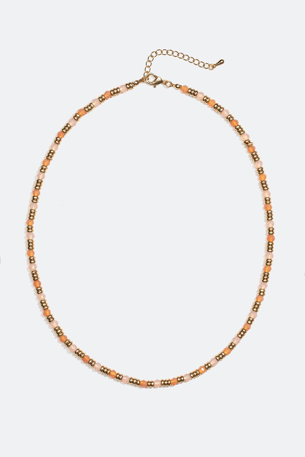 Halskjede med gullfargede og rosa perler i gruppen Smykker / Halskjeder hos Glitter (254001525402)