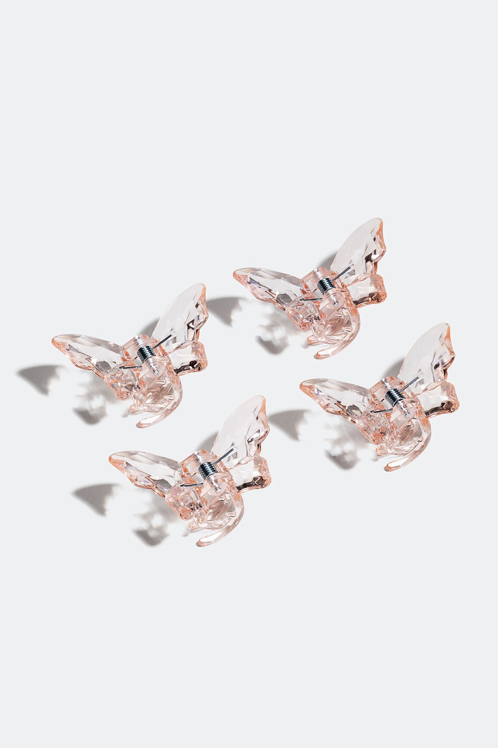 Små rosa hårklemmer med sommerfugler, 4-pakning i gruppen Håraccessories / Spenner & klemmer / Hårklyper hos Glitter (331001565400)