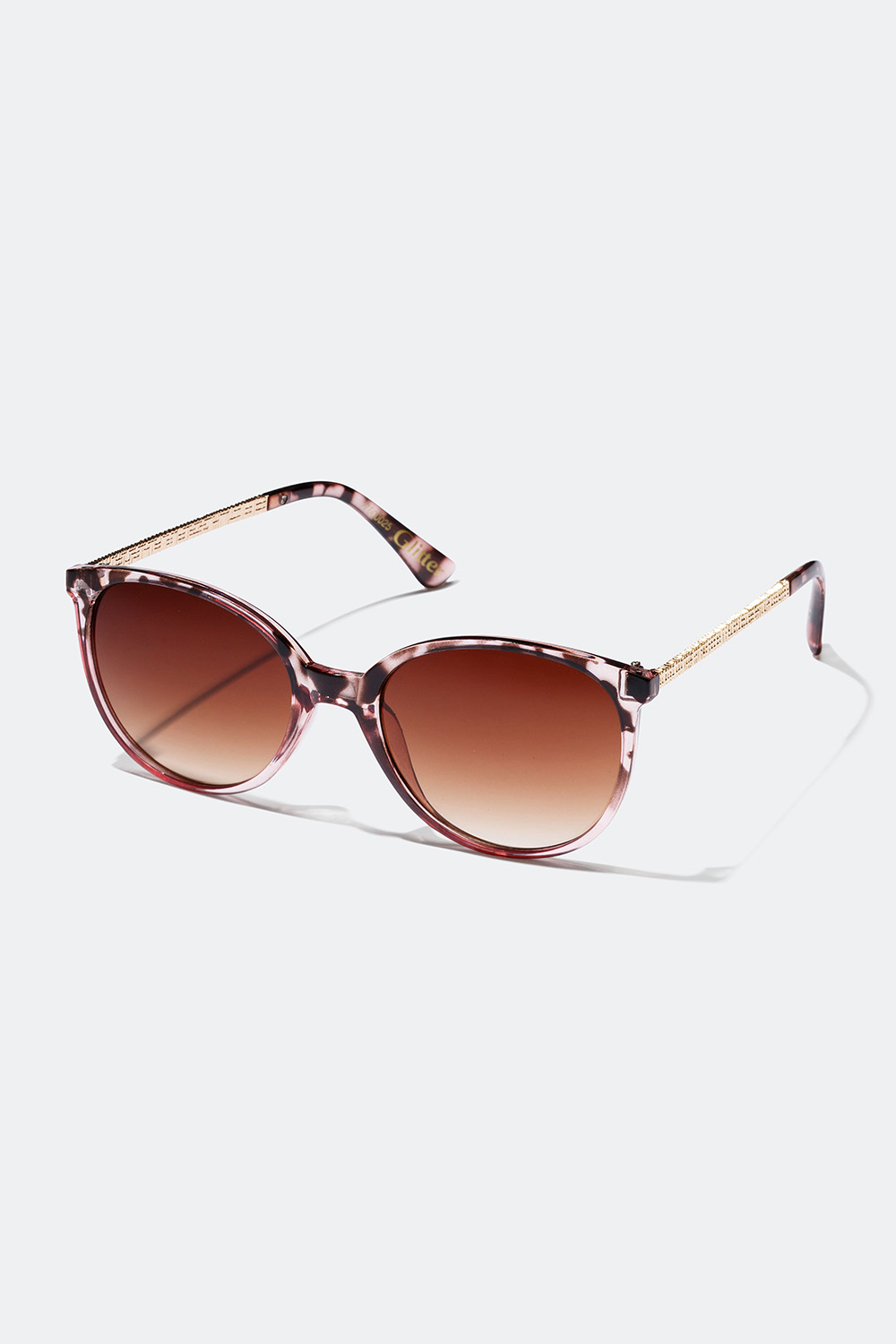 Solbrille med gylne detaljer