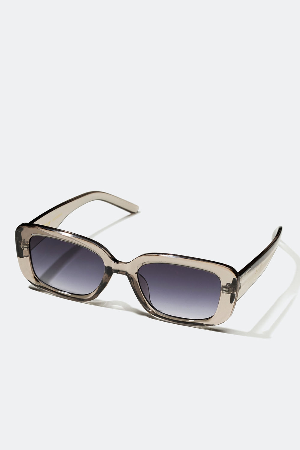 Rektangulære solbriller med gjennomsiktig, lysegrå innfatning i gruppen Accessories / Solbriller hos Glitter (176000909500)