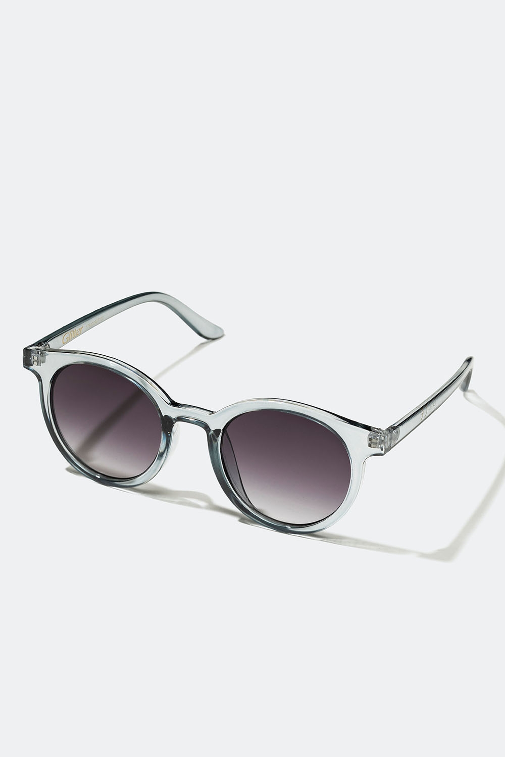 Runde solbriller med gjennomsiktig, lysegrå innfatning i gruppen Accessories / Solbriller hos Glitter (176000987100)