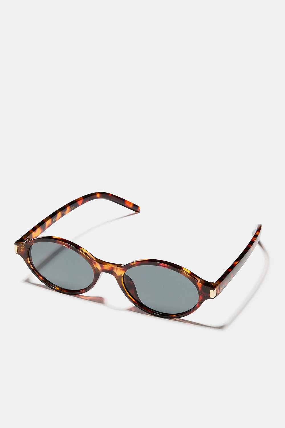 Brune, ovale solbriller med gullfargede detaljer i gruppen Accessories / Solbriller hos Glitter (176001410700)