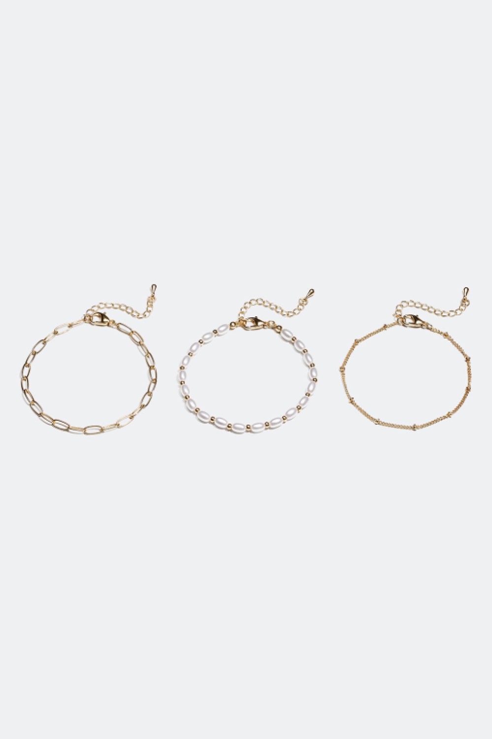 Armlenke og armbånd med hvite perler, 3-pakning i gruppen Smykker / Armbånd / Flerpakning hos Glitter (25100027)