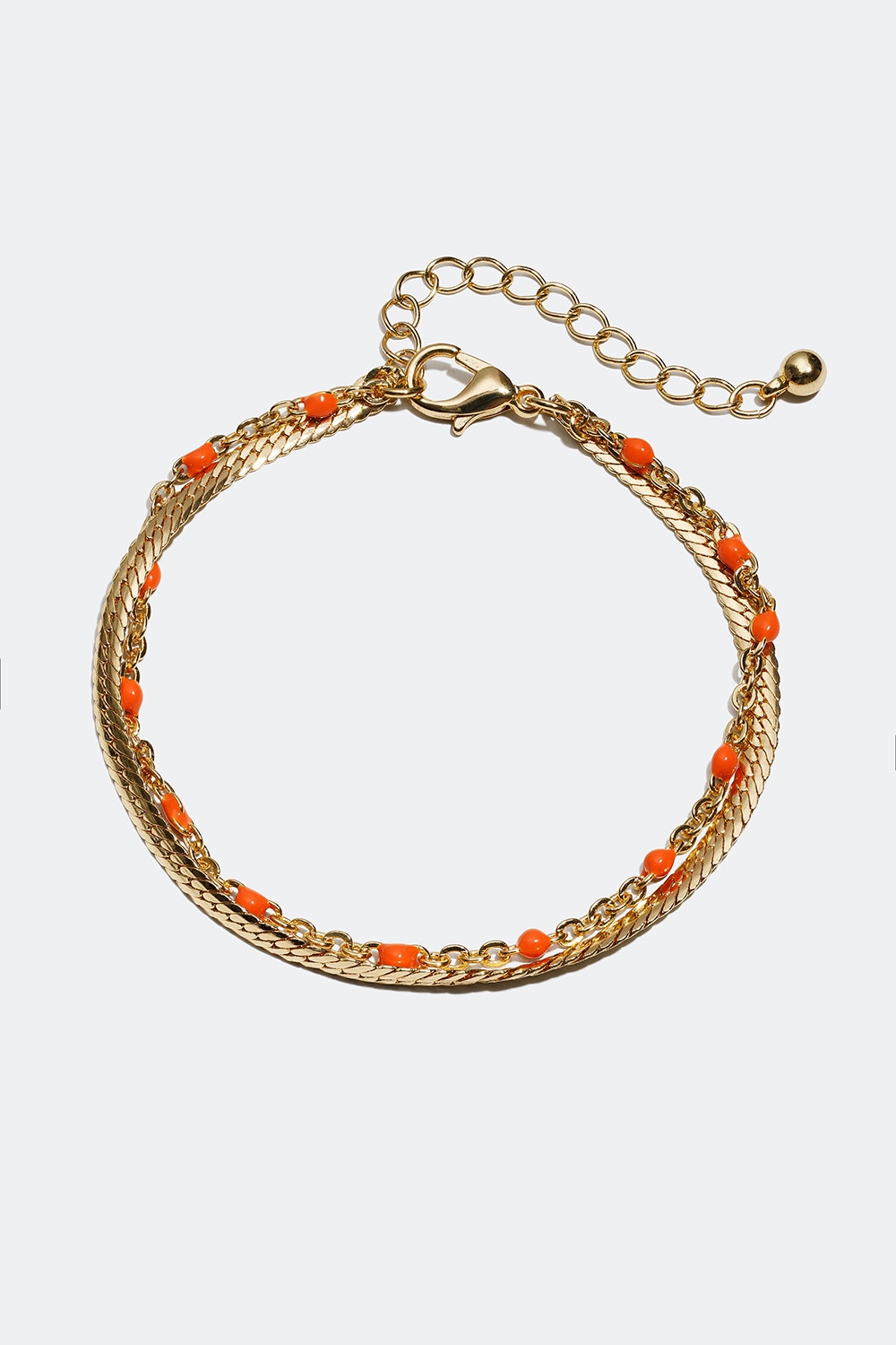 Gullfarget dobbelt armbånd med detaljer i oransje i gruppen Smykker / Armbånd / Tynne hos Glitter (251000594502)
