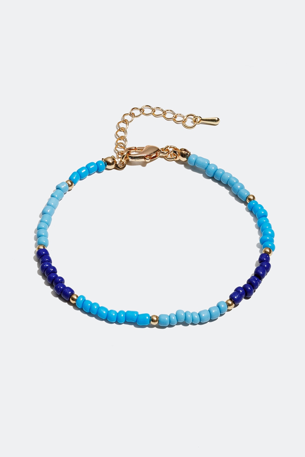 Armbånd med blå perler i gruppen Smykker / Armbånd / Tynne hos Glitter (251000687402)