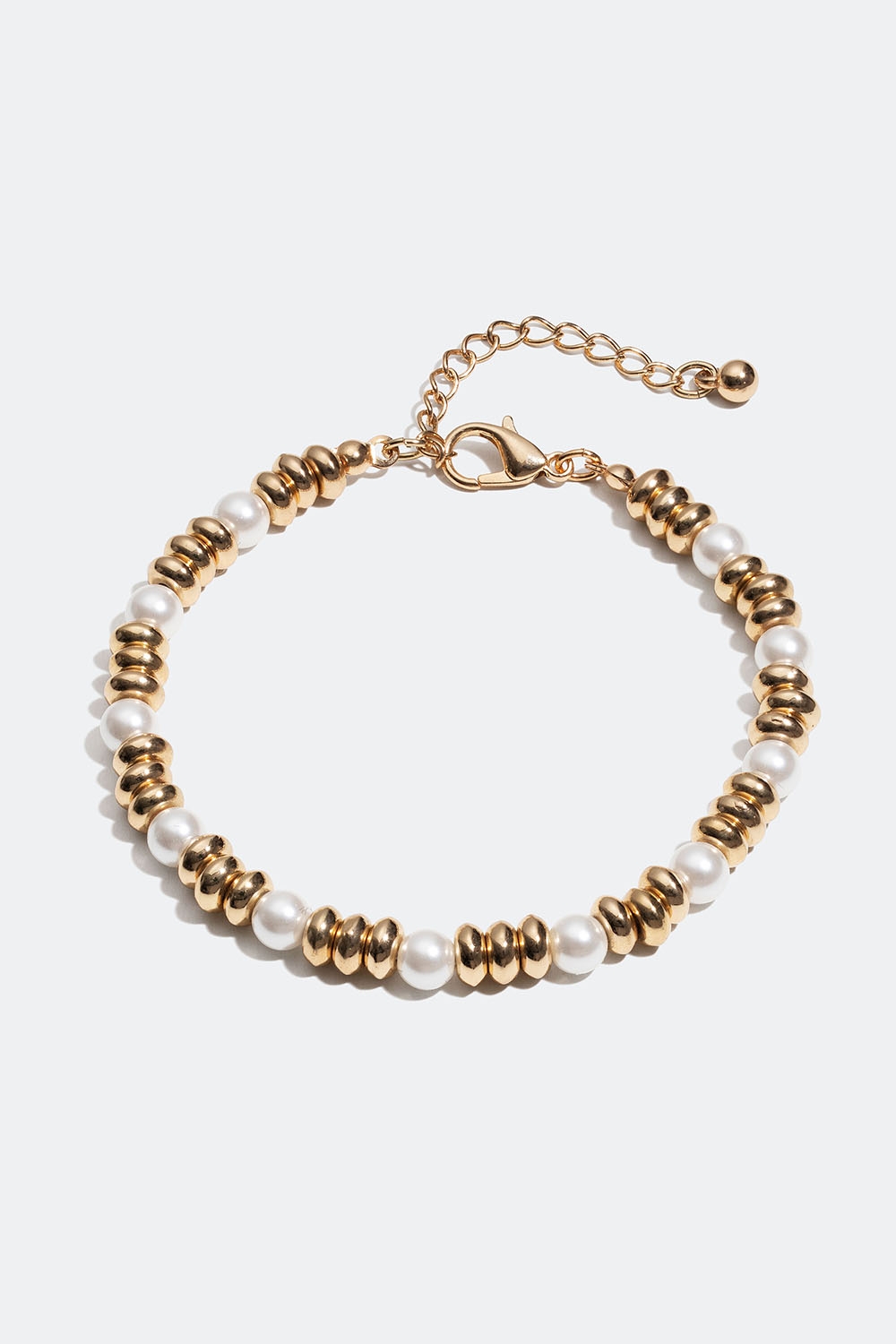 Armbånd med gullfargede og hvite perler i gruppen Smykker / Armbånd / Tynne hos Glitter (251000912002)