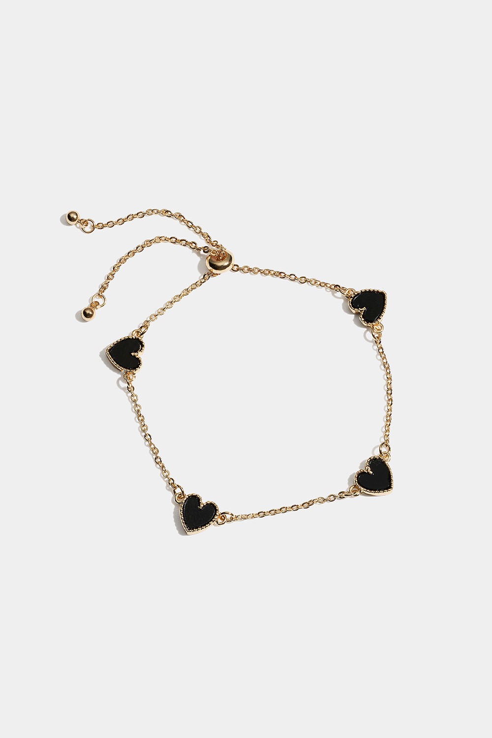 Gullfarget armbånd med sorte hjerter i gruppen Store week / hos Glitter (251001659002)