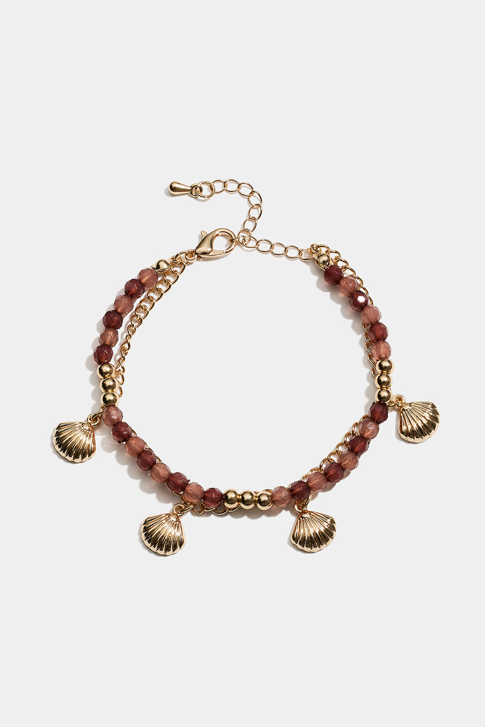 Dobbelt armbånd med brune perler og skjell i gruppen Smykker / Armbånd hos Glitter (251002118002)