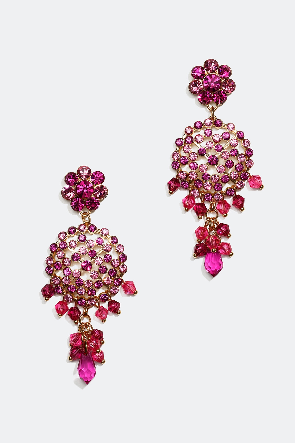 Øredobber med runde anheng og glassteiner i en rosa fargeblanding i gruppen Festive Season Collection hos Glitter (253002992000)