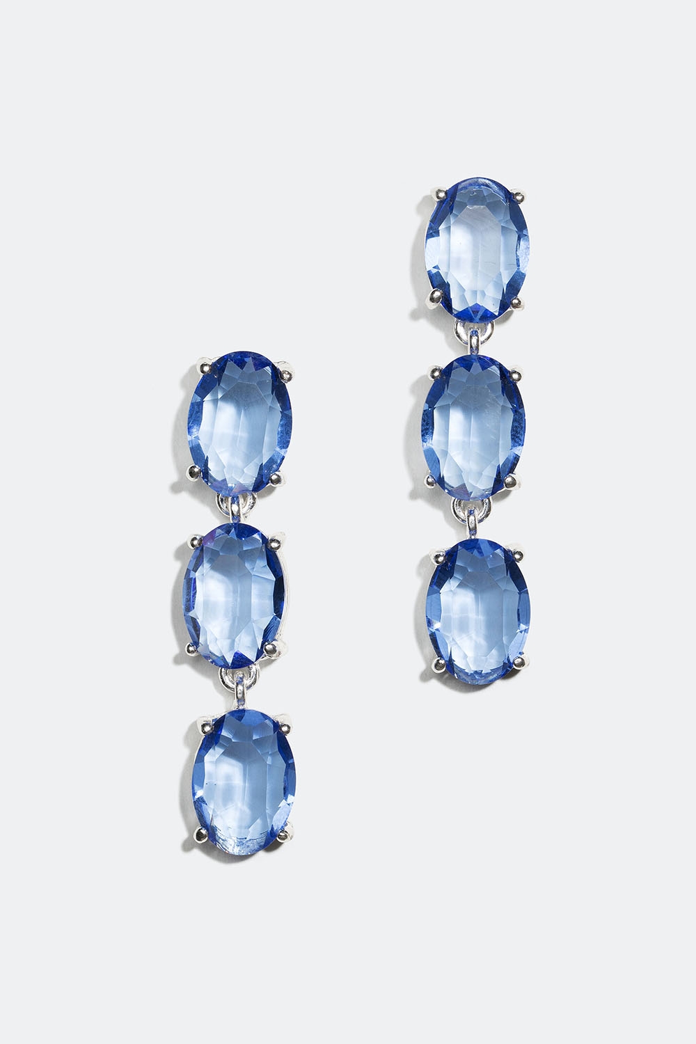 Øredobber med blå, ovale steiner i gruppen Smykker / Øredobber hos Glitter (253004657001)