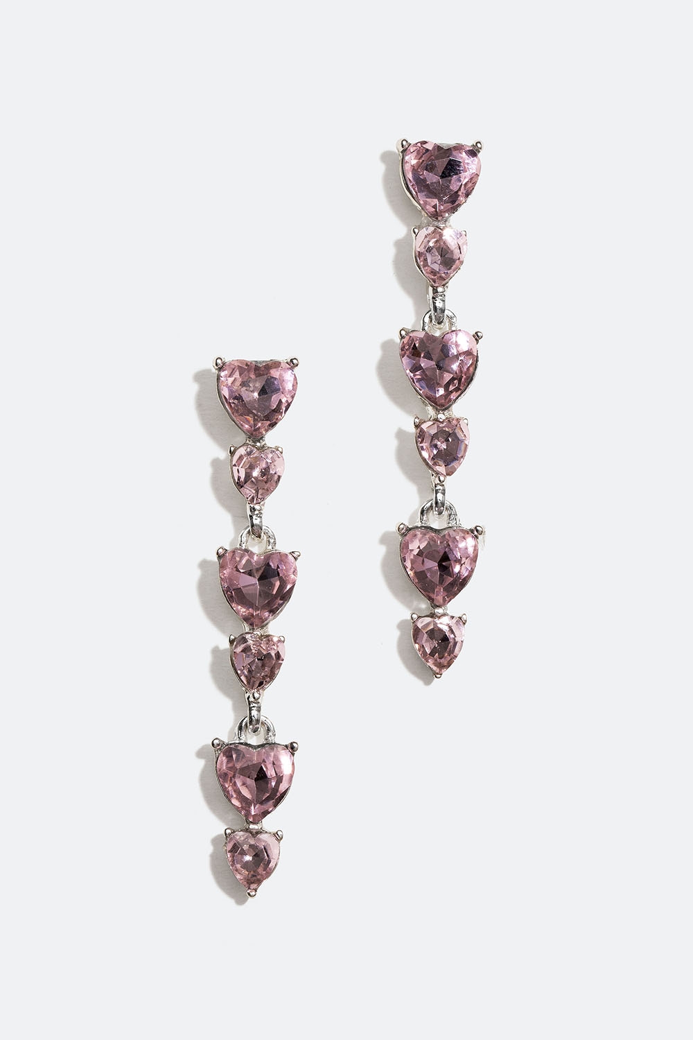 Lange, øredobber med rosa, hjerteformede glassteiner i gruppen Smykker / Øredobber hos Glitter (253005845402)