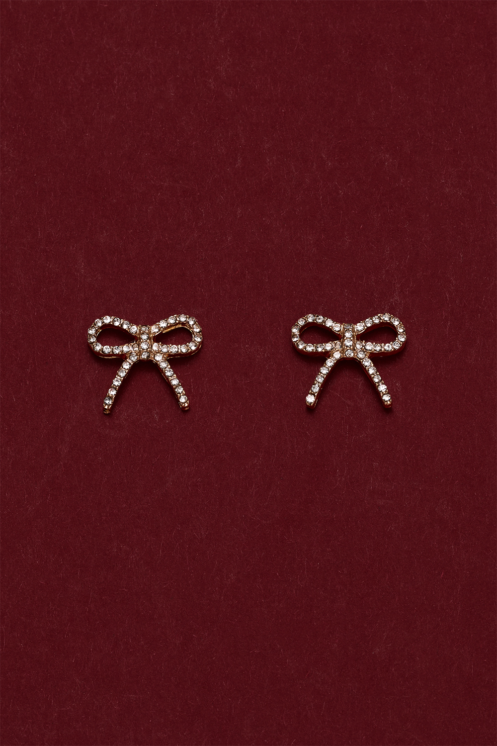 Gullfargede sløyfeøredobber med strass i gruppen Smykker / Øredobber / Studs hos Glitter (253009642002)