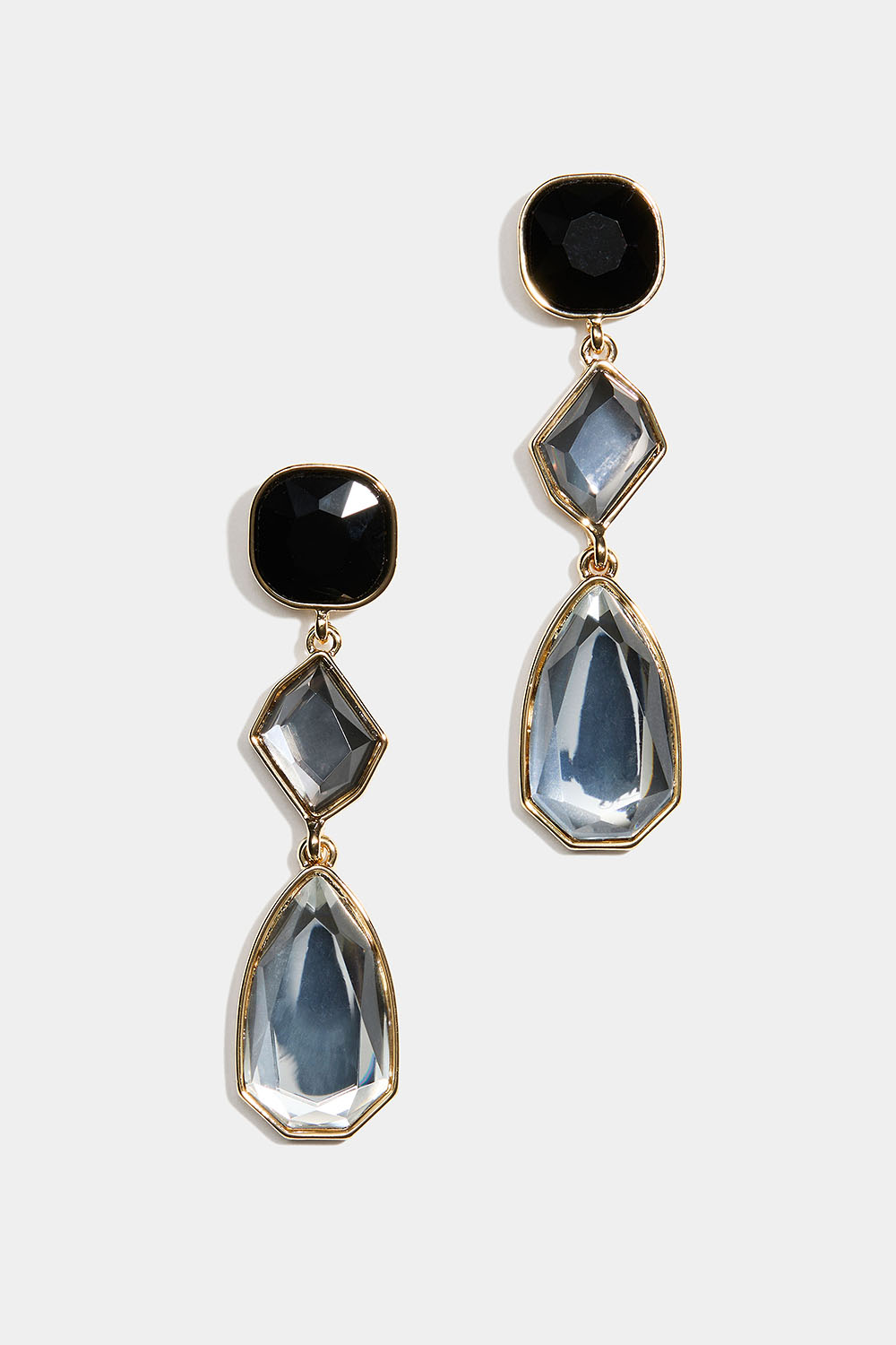 Øredobber med svarte og hvite steiner i ulike former i gruppen Smykker / Øredobber / Rhinestone hos Glitter (253010329402)