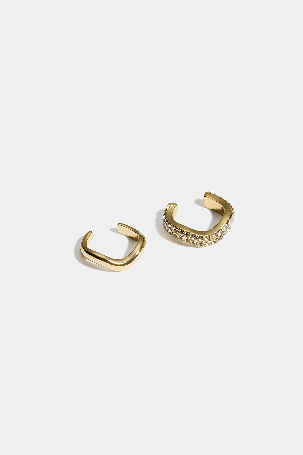 Bølgede gullfargede ear cuffs med glassteiner, 2-pakning i gruppen Smykker / Øredobber / Earcuffs hos Glitter (253011782002)