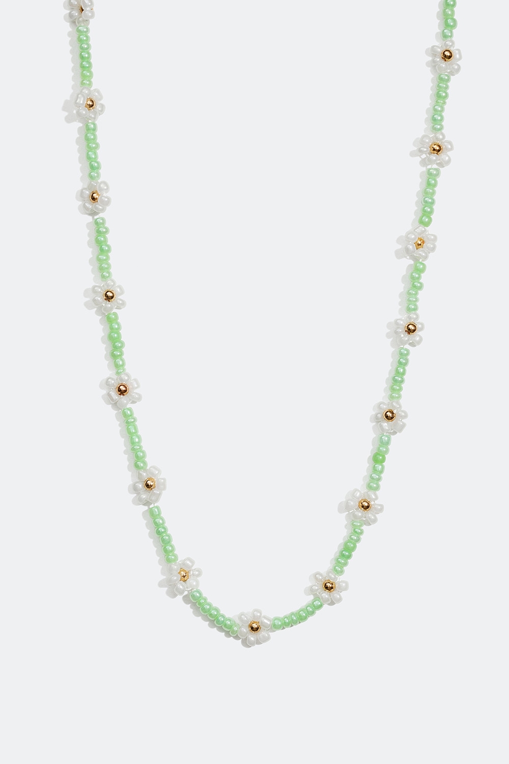Grønt kort halskjede med hvite blomster i gruppen Smykker / Halskjeder hos Glitter (254000957402)