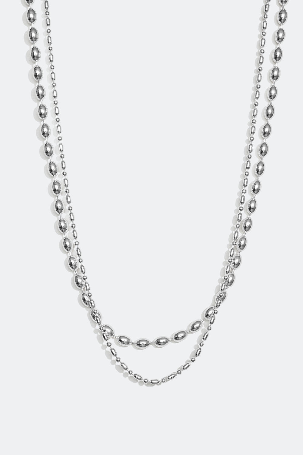 Dobbelt halskjede med ovale perler i metall i gruppen Smykker / Halskjeder hos Glitter (254001311001)