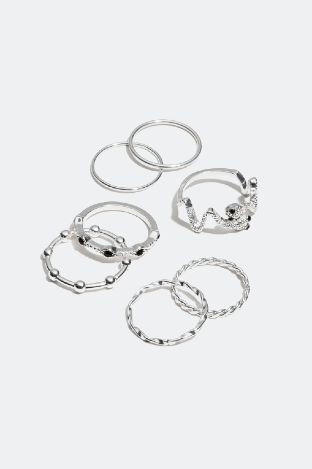 7-pakning ringer med slangemotiver og tvunnet design i gruppen Smykker / Ringer / Flerpakning hos Glitter (25600014)