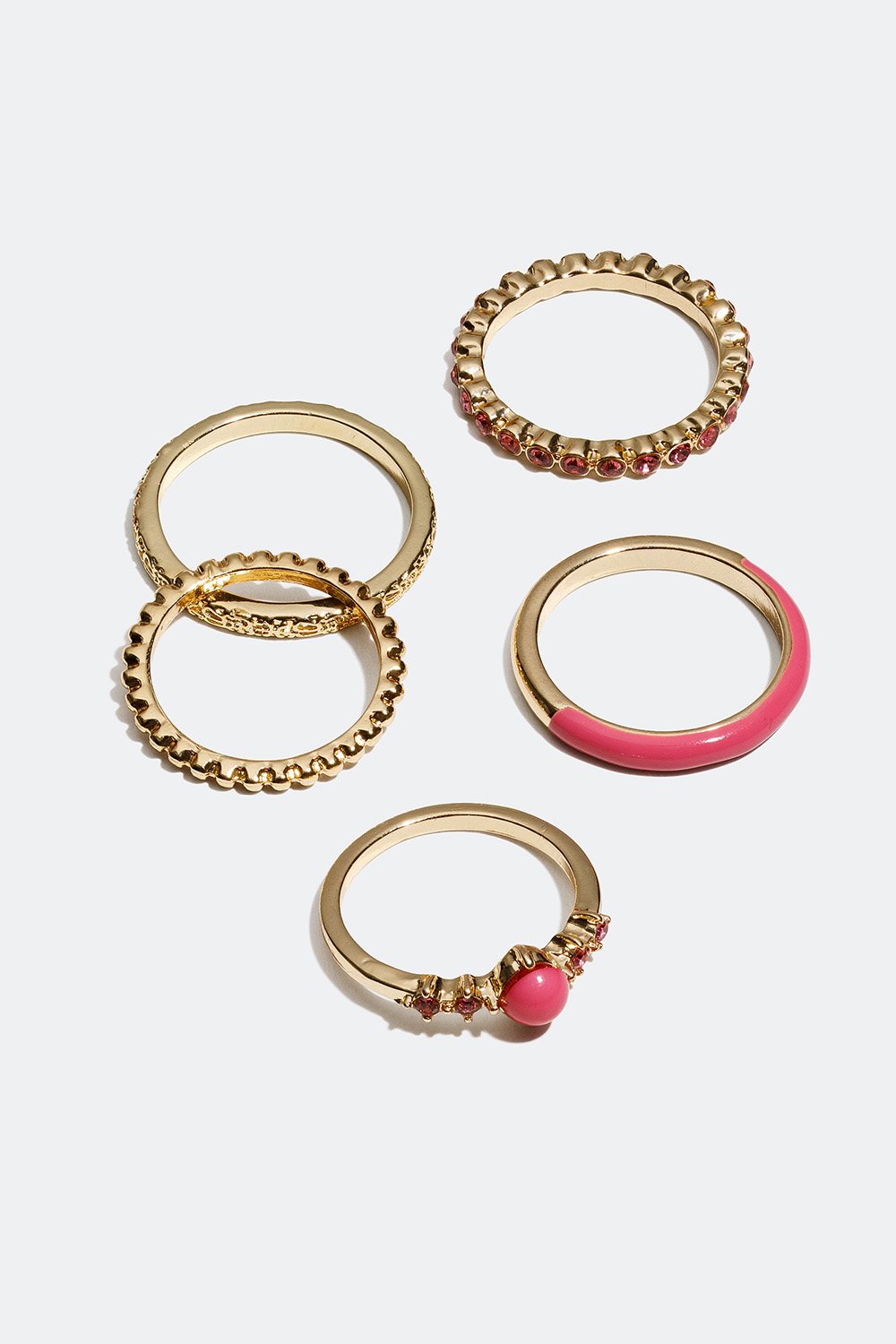Gullfargede ringer med detaljer i rosa, 5-pakning i gruppen Smykker / Ringer / Flerpakning hos Glitter (256000625)