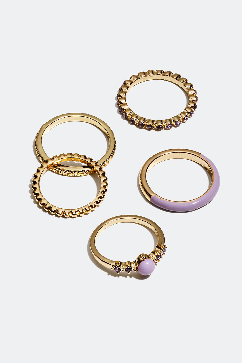 Gullfargede ringer med detaljer i lilla, 5-pakning i gruppen Smykker / Ringer / Flerpakning hos Glitter (2560006265)