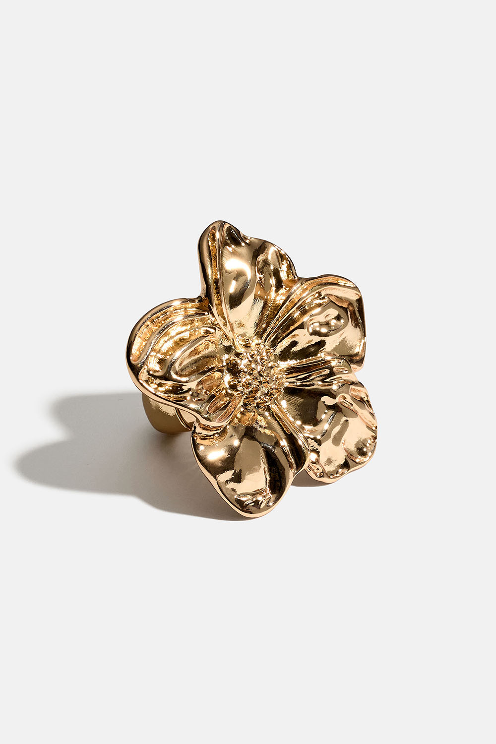 Justerbar gullfarget ring med blomst i gruppen Smykker / Ringer hos Glitter (256001742000)