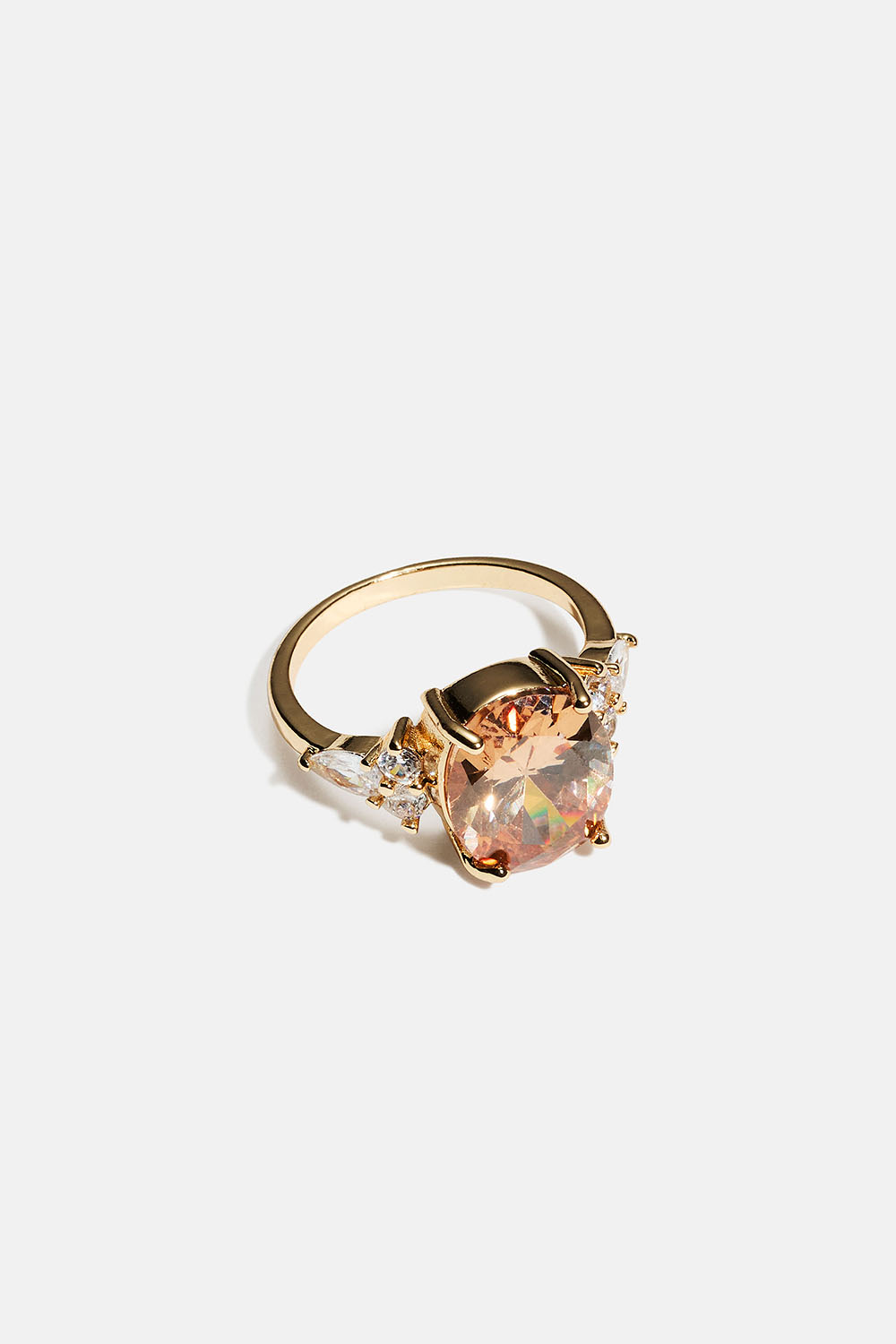 Gullfarget ring med stor oval glasstein i gruppen Smykker / Ringer hos Glitter (2560018383)