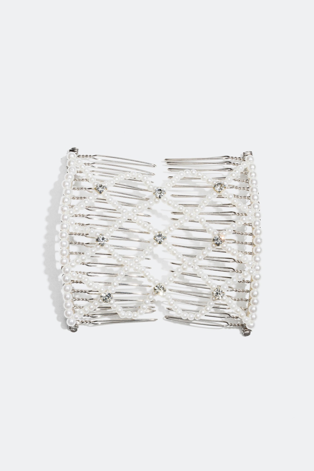 Dekorasjonskam med perler og glasstener