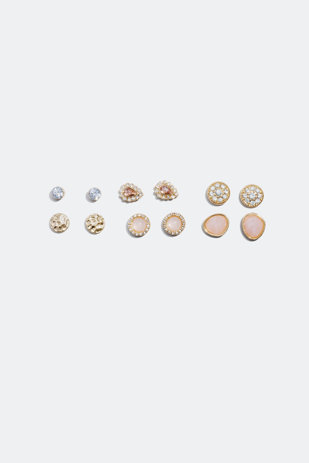 6-pakning øredobber i toner av gull, rosa og hvitt i gruppen Smykker hos Glitter (323476)