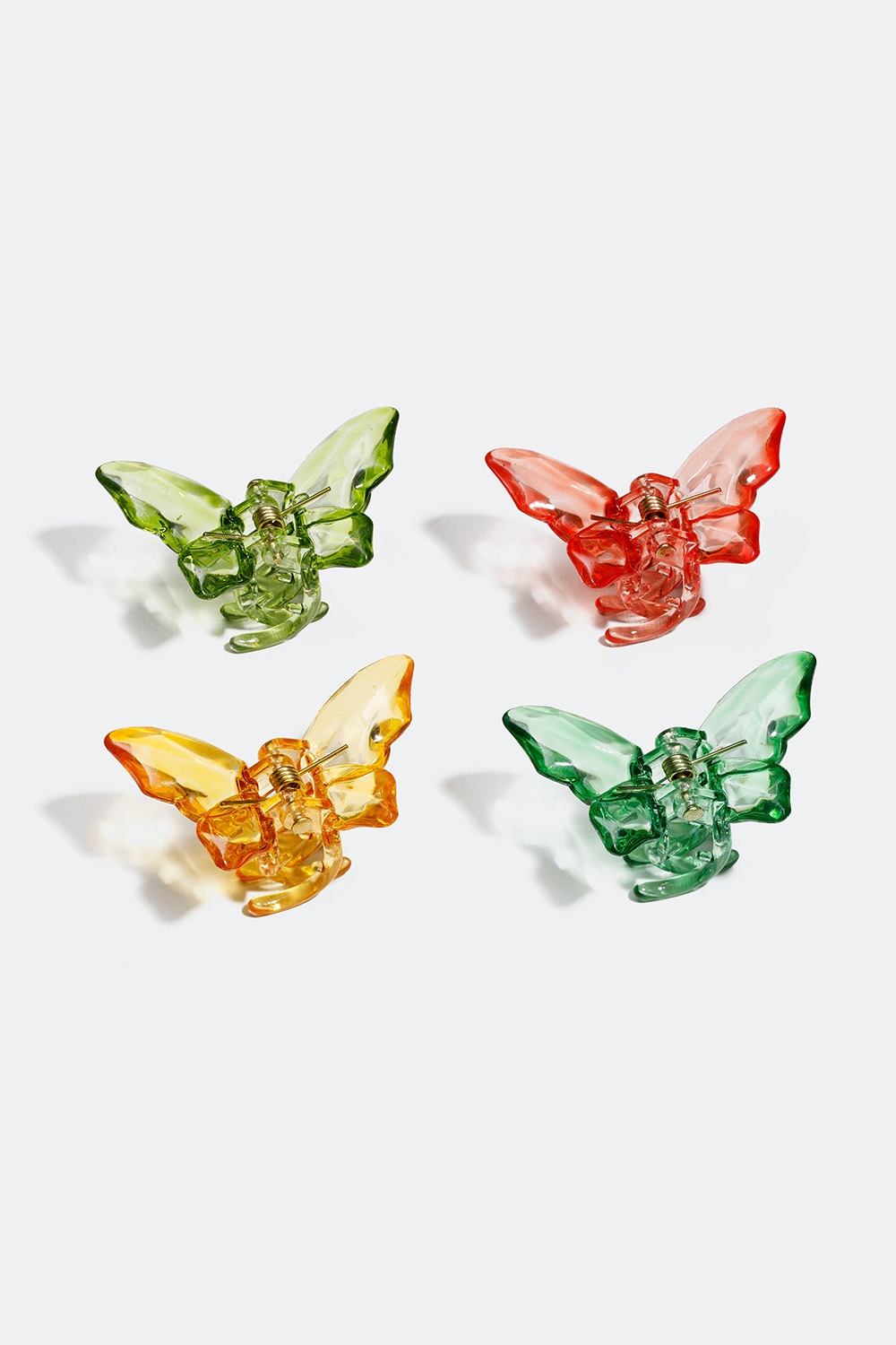 Små hårklemmer med sommerfugler i grønt, gult og rosa, 4-pakning i gruppen Håraccessories / Spenner & klemmer / Flerpakning hos Glitter (331001277800)