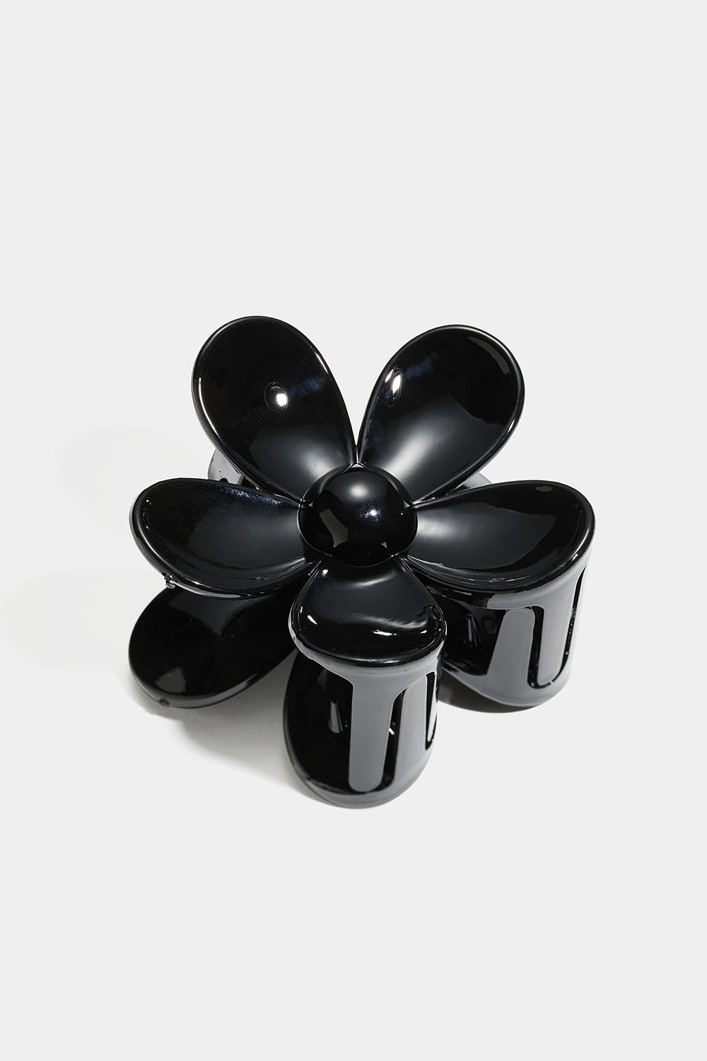 Svart blomsterformet hårklemme i gruppen Håraccessories / Spenner & klemmer / Hårklyper hos Glitter (331001829000)