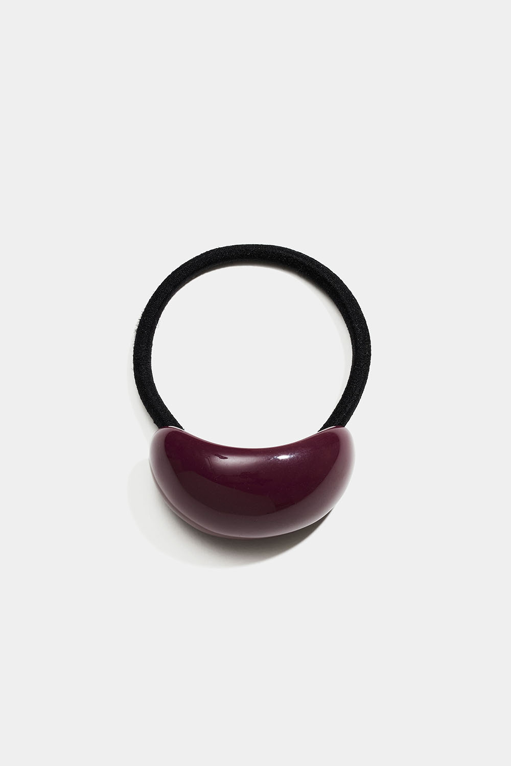 Svart hårstrikk med vinrød plastdetalj i gruppen Håraccessories / Hårstrikker / Strikker med detaljer hos Glitter (334001586300)
