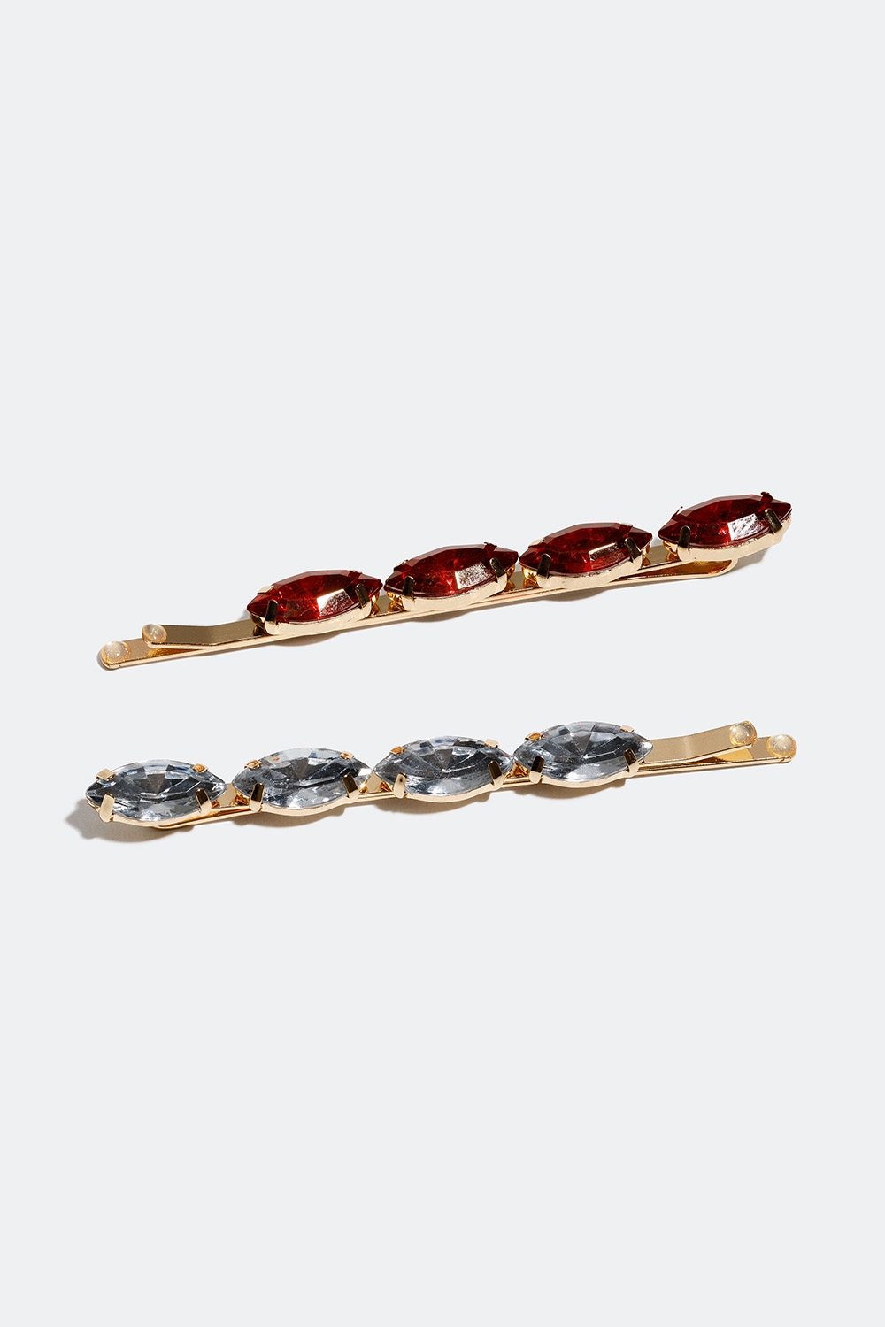 Hårspenner med klare og røde steiner, 2-pakning i gruppen Håraccessories / Spenner & klemmer / Hårspenner hos Glitter (335000756400)