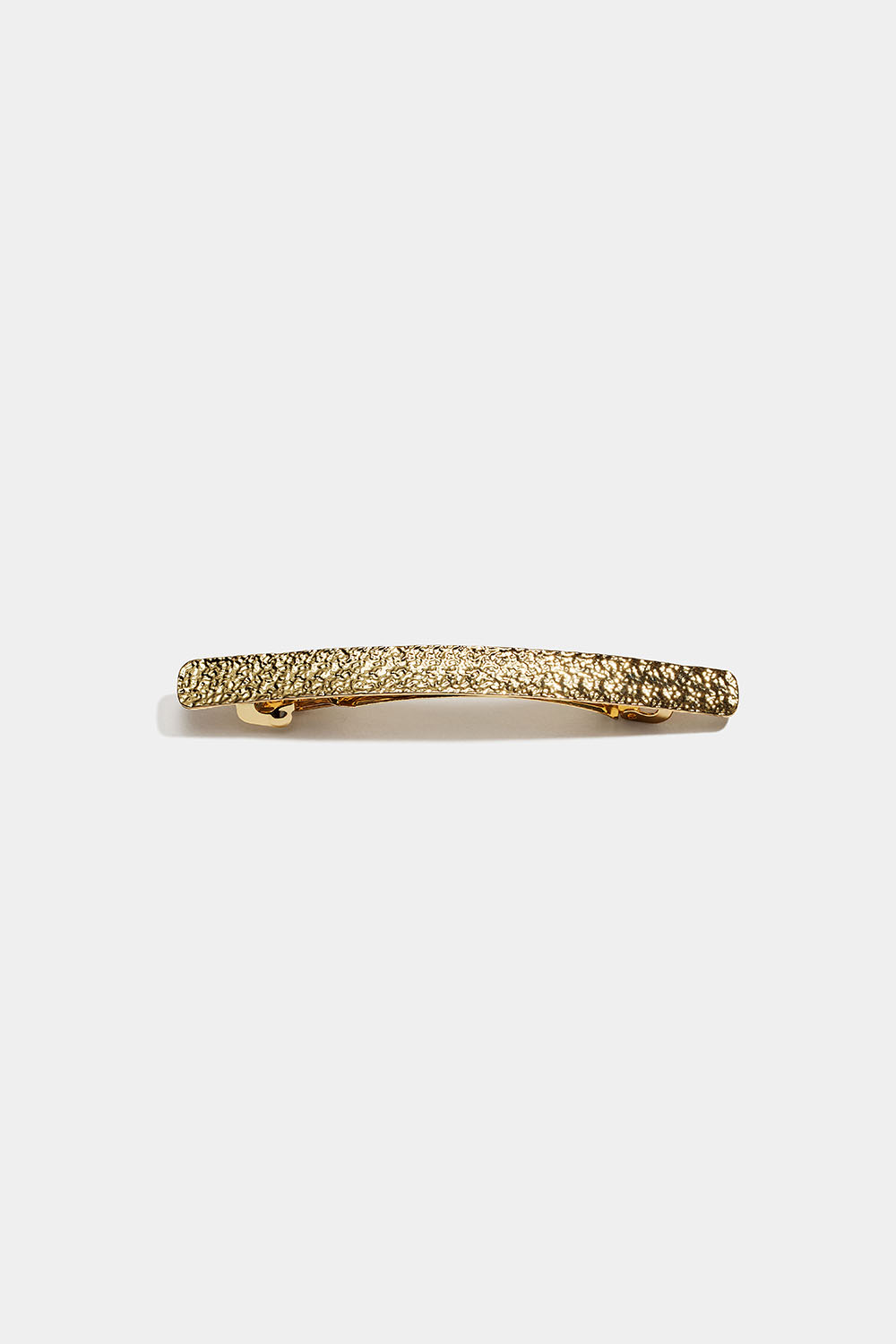 Slank gullfarget hårspenne med hamret design i gruppen Håraccessories / Spenner & klemmer / Hårspenner hos Glitter (335002262000)