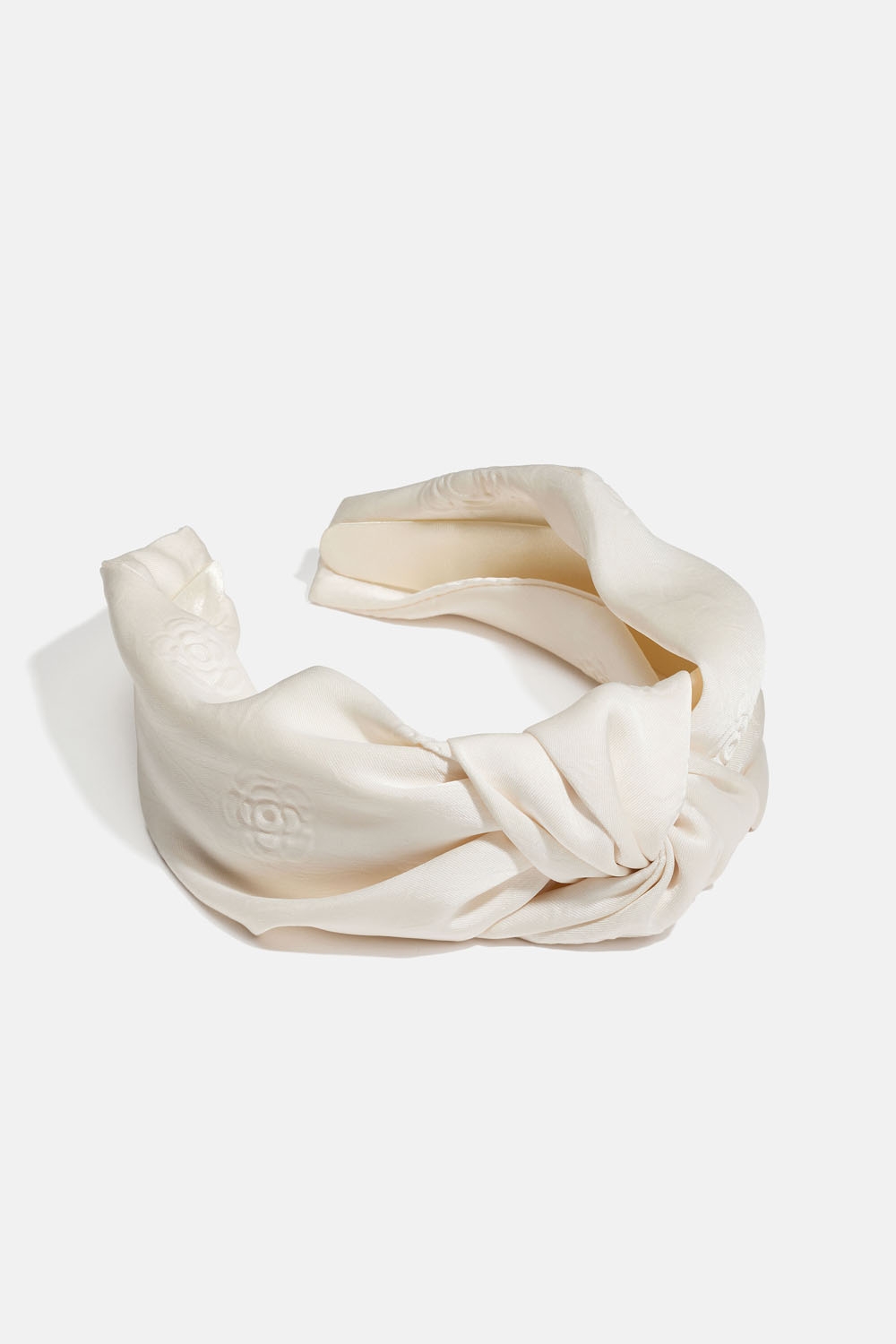 Hvit hårbøyle med knute og rosemønster i gruppen Håraccessories / Hårbøyler / Brede hos Glitter (336001513100)