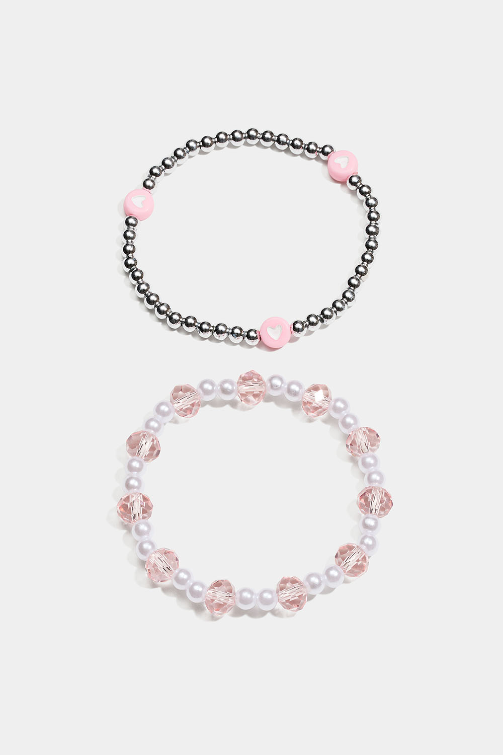 Elastiske armbånd med perler i rosa, hvitt og sølvfarge i gruppen Barn / Barnesmykker / Barnearmbånd hos Glitter (402000469900)