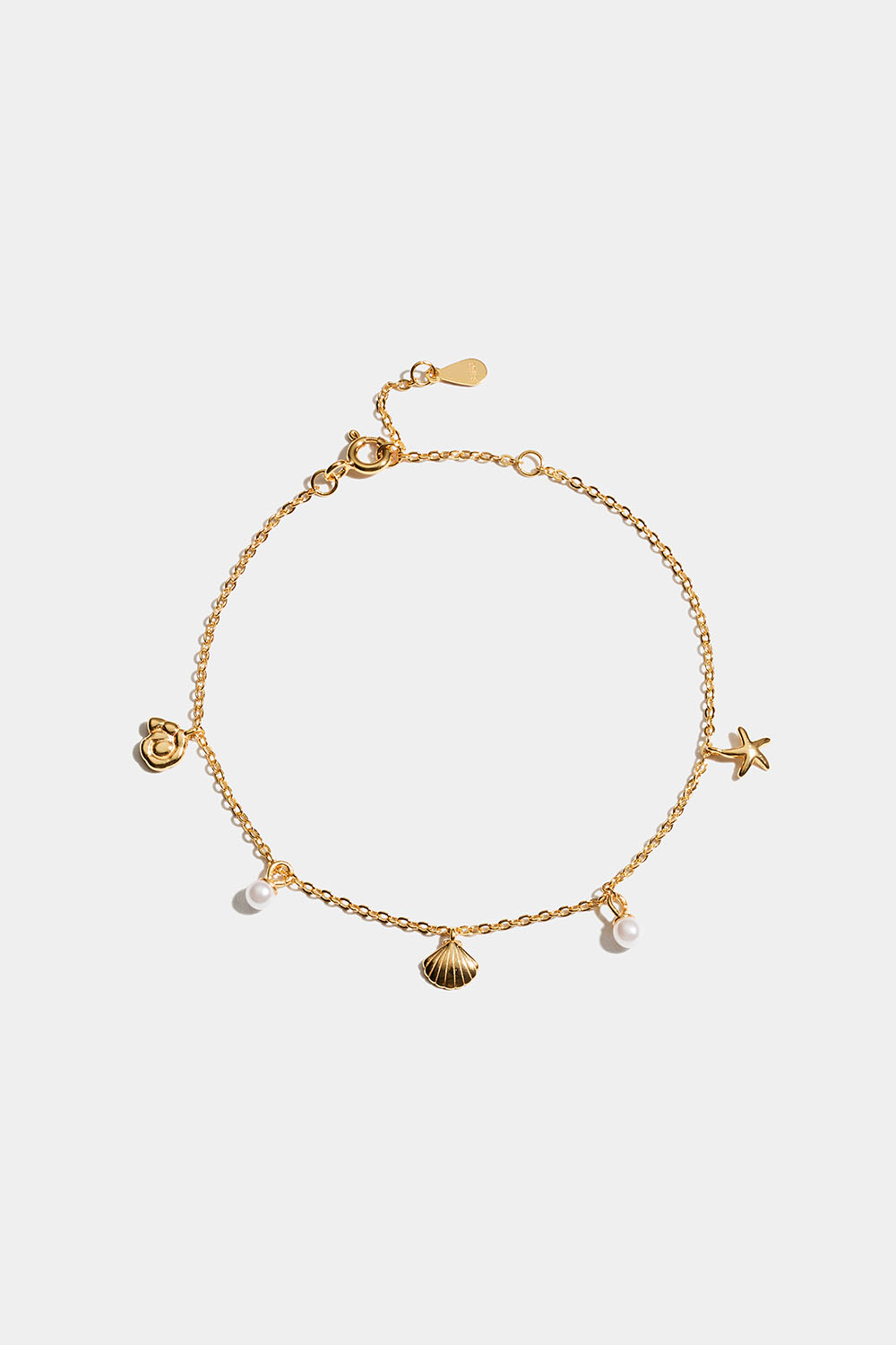 Armbånd i 18 karat gullbelagt sterlingsølv med anheng fra havet i gruppen Gullbelagt ekte sølv / Gullbelagte armbånd hos Glitter (551001112002)