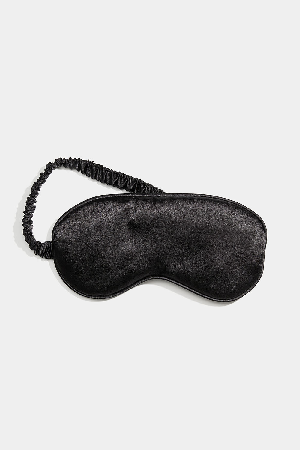 Svart sovemaske i sateng