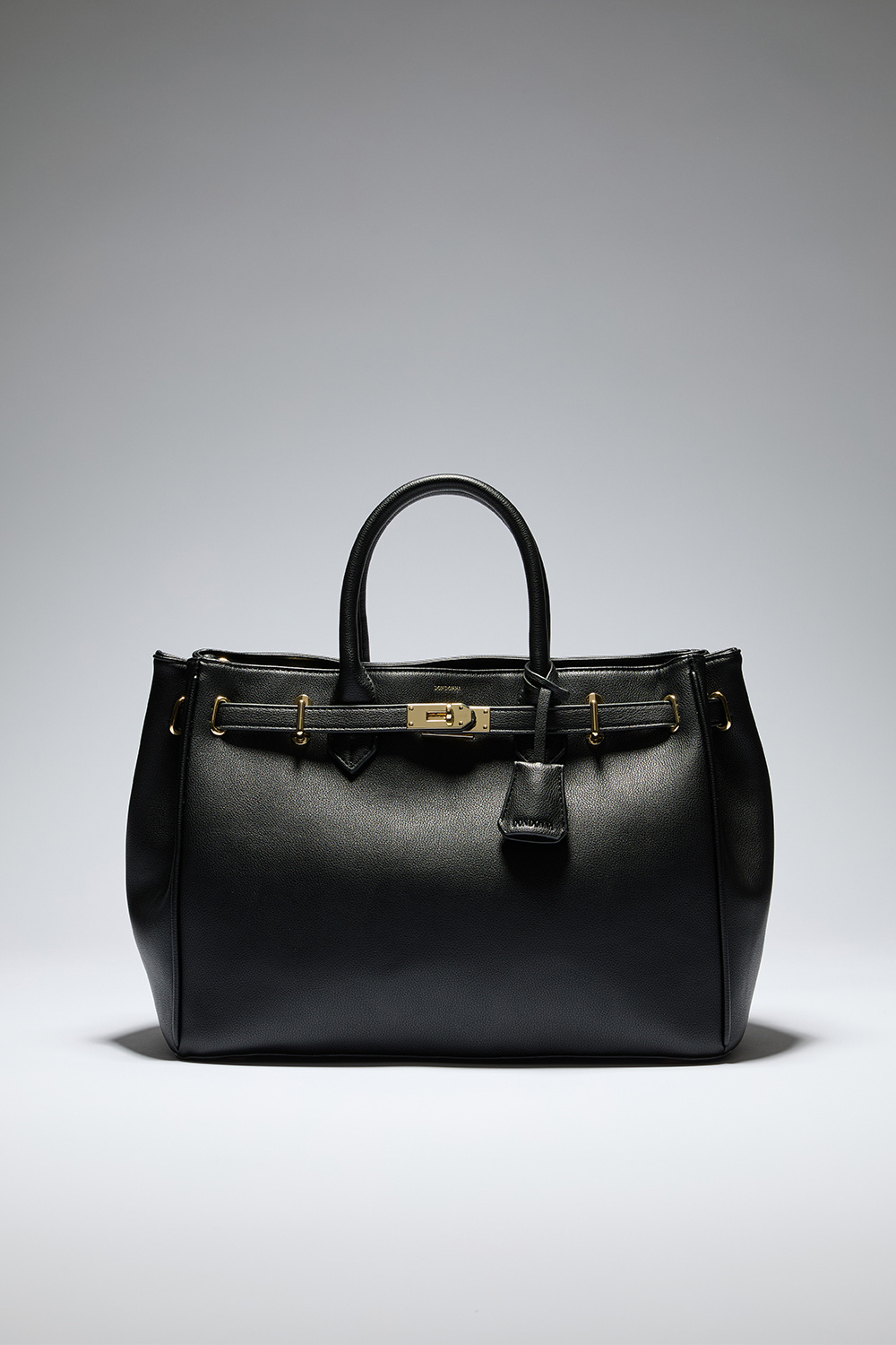 Handleveske med beltedetalj