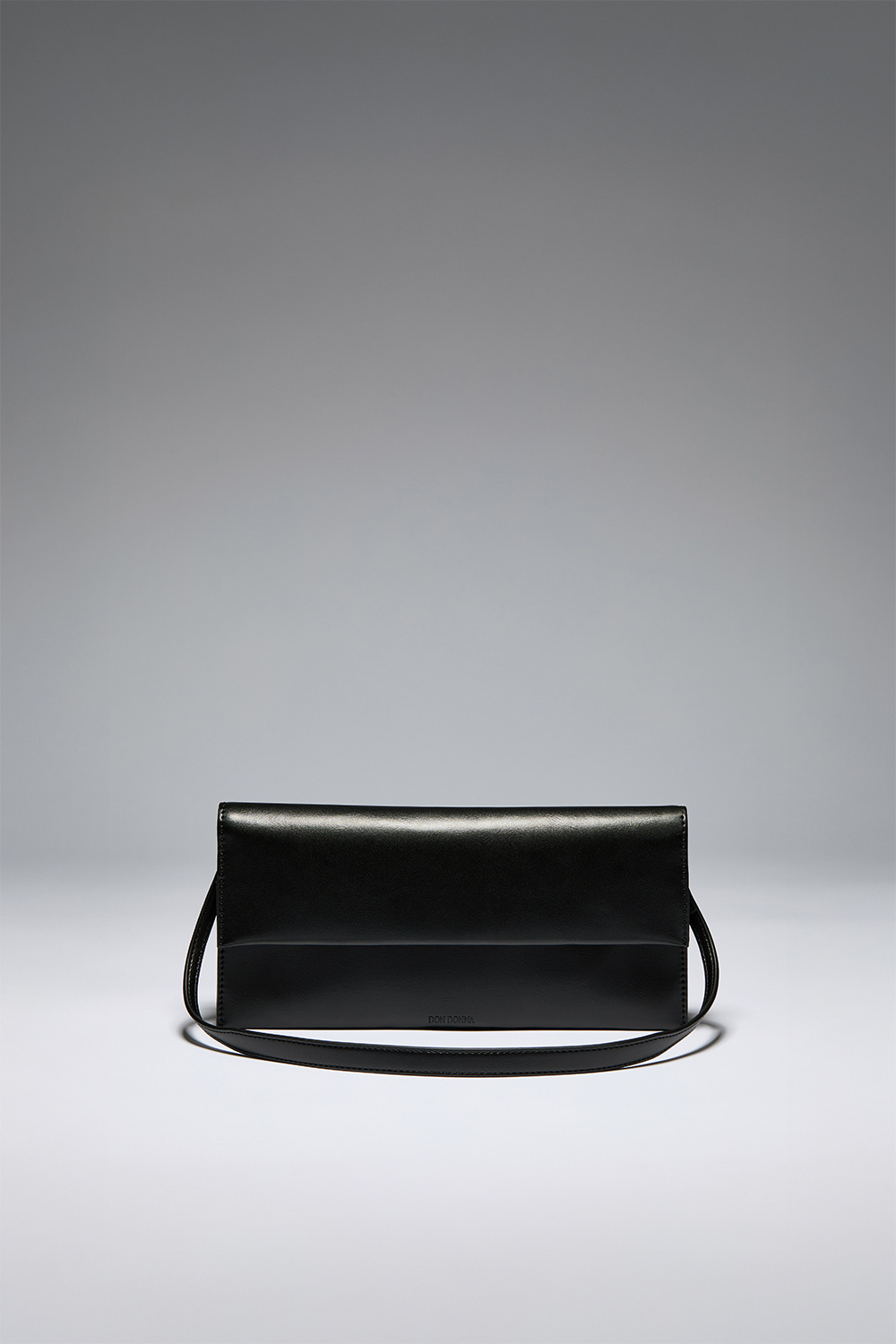 Svart konvoluttveske