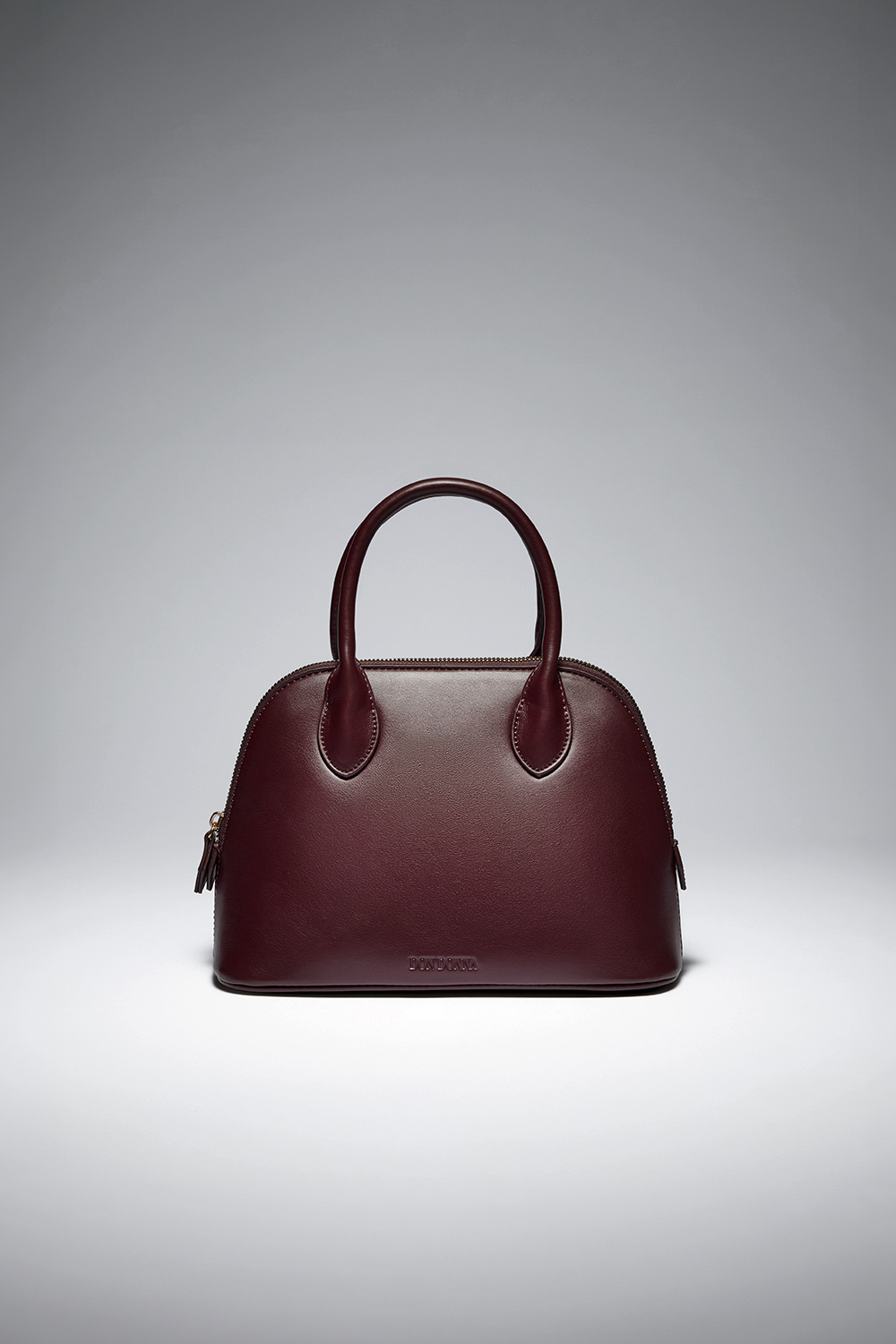 Vinrød bowlingveske