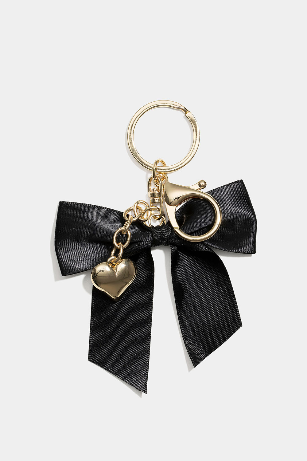 Veskedekor med sløyfe og hjerte