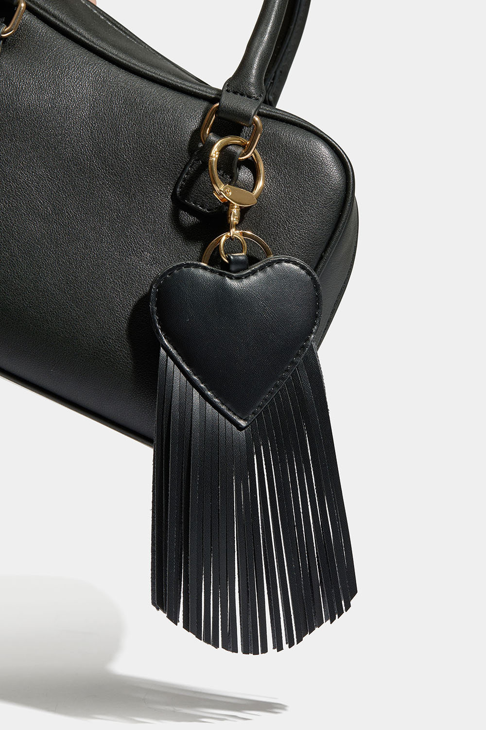 Veskedekor med hjerter og frynser