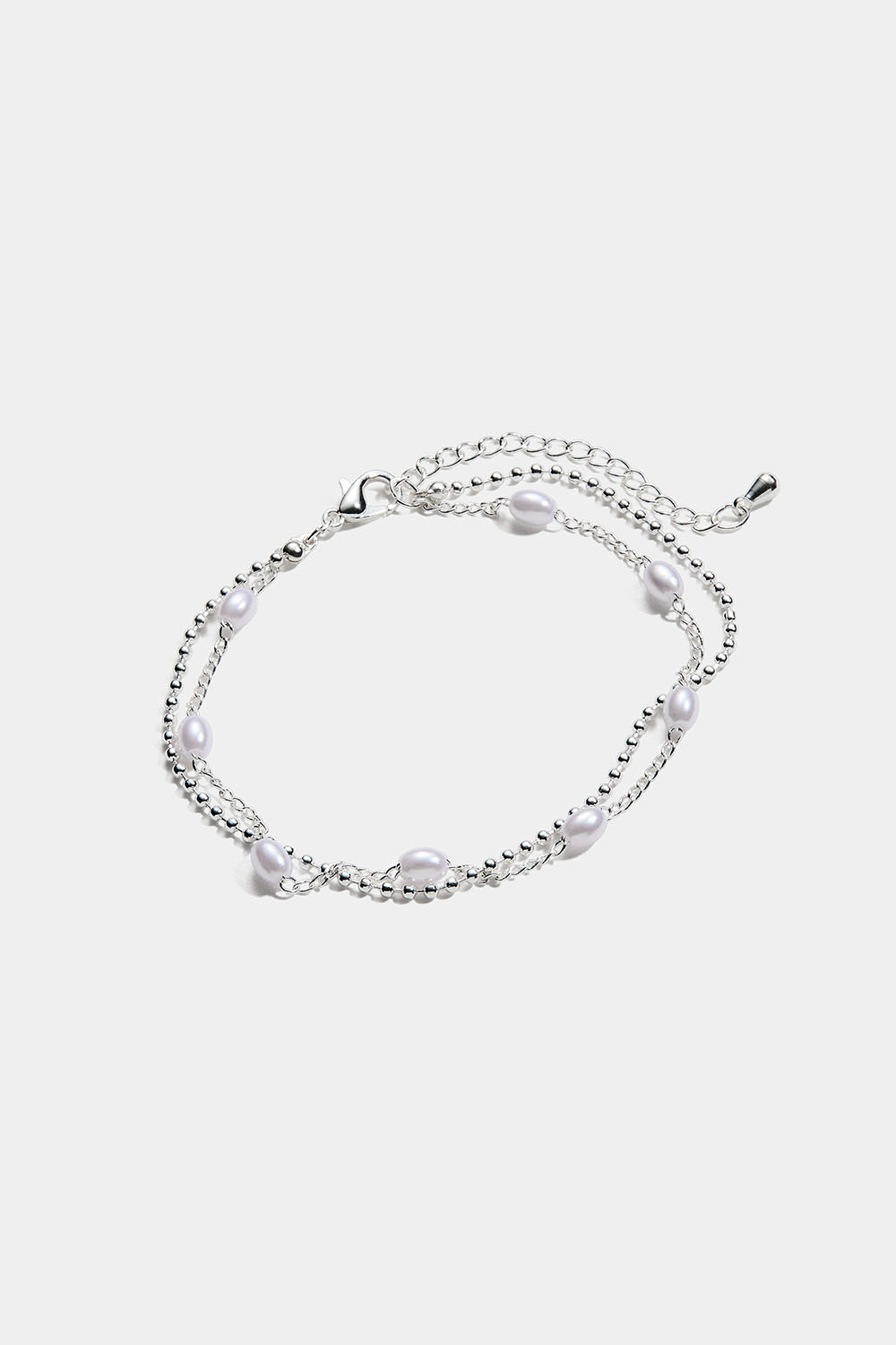 Dobbeltarmbånd med ovale perler