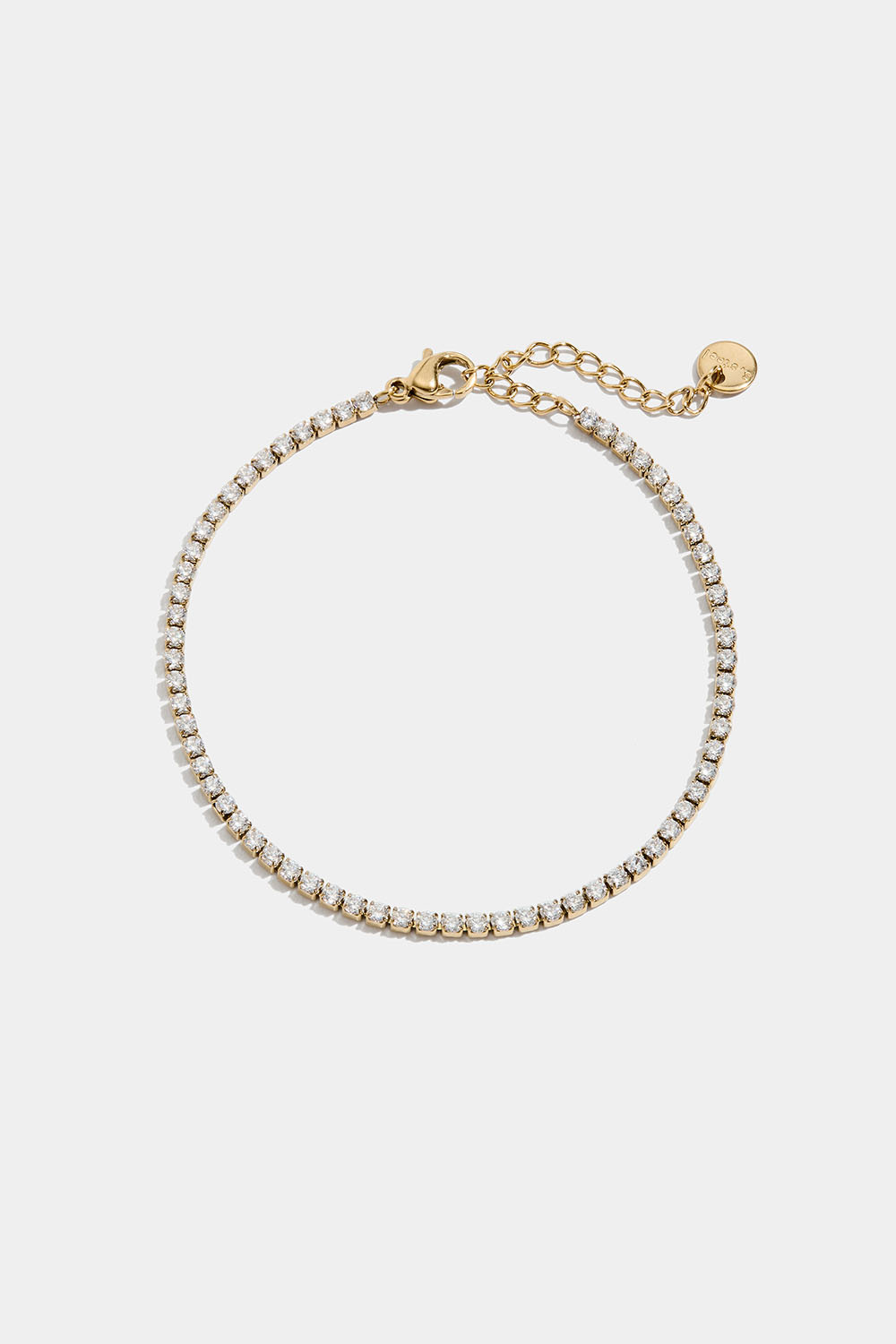 Tennisarmbånd i stål med 18 karat gull og Cubic Zirconia.