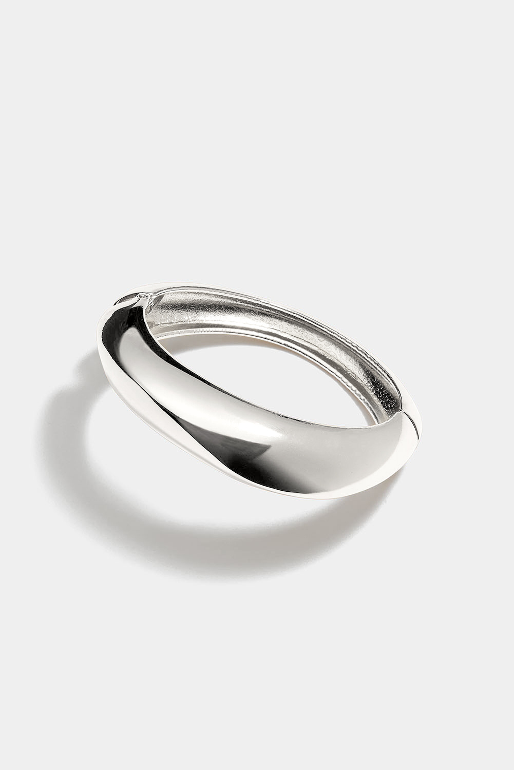 Mansjettarmbånd med organisk form