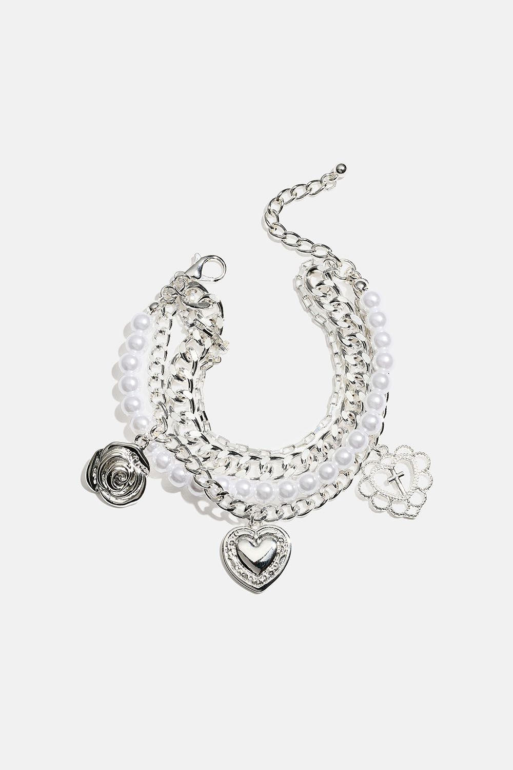 Armbånd med fire lenker og sjarms