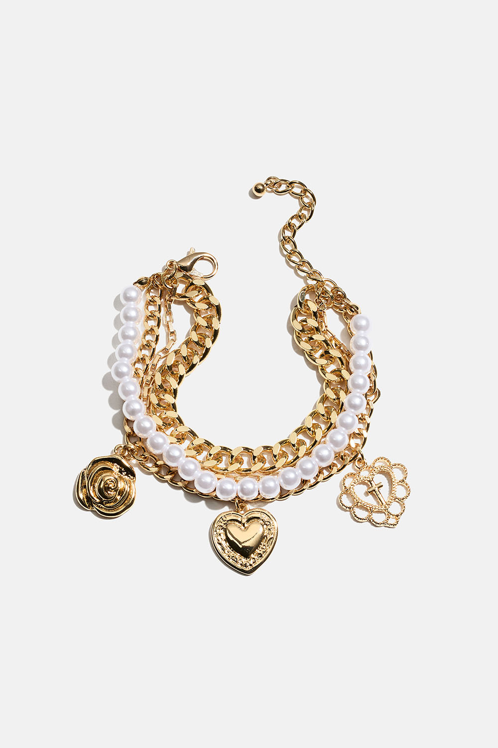 Gullfarget armbånd med fire lenker og sjarms