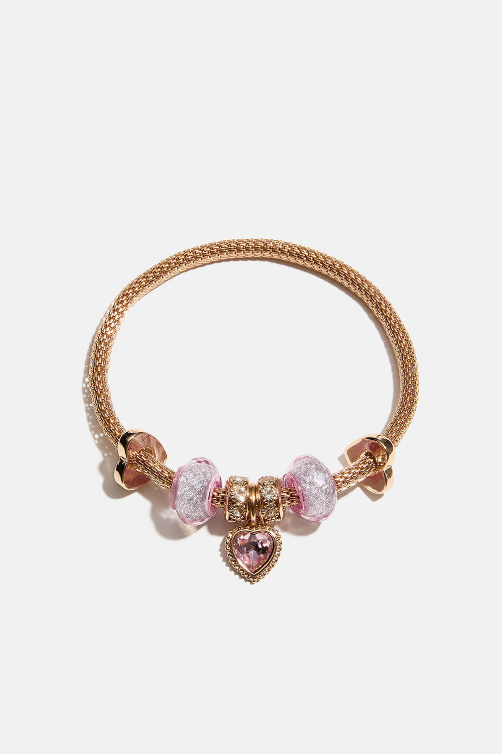 Elastisk gullfarget armbånd med anheng i rosa detaljer