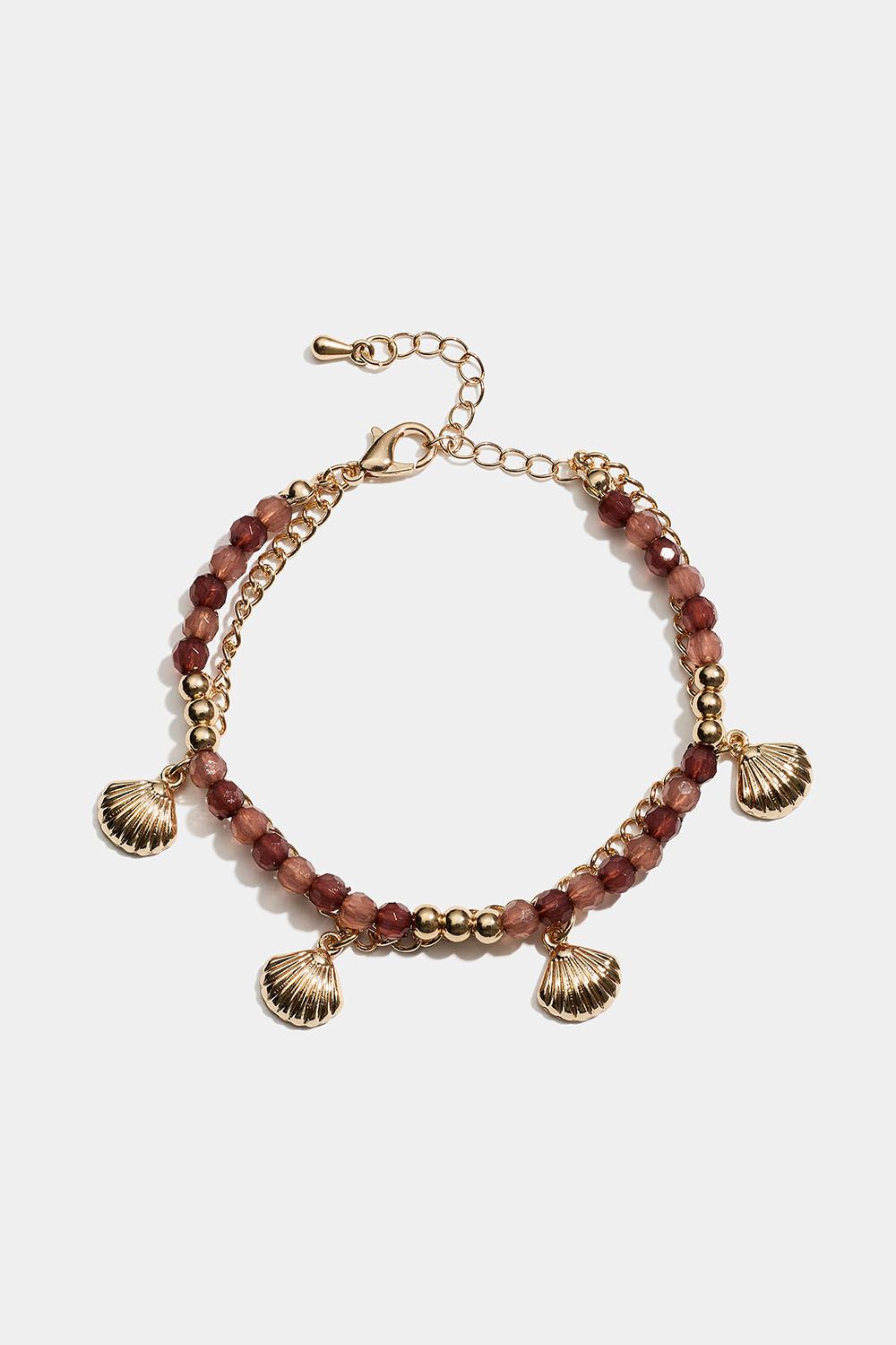Dobbelt armbånd med brune perler og skjell