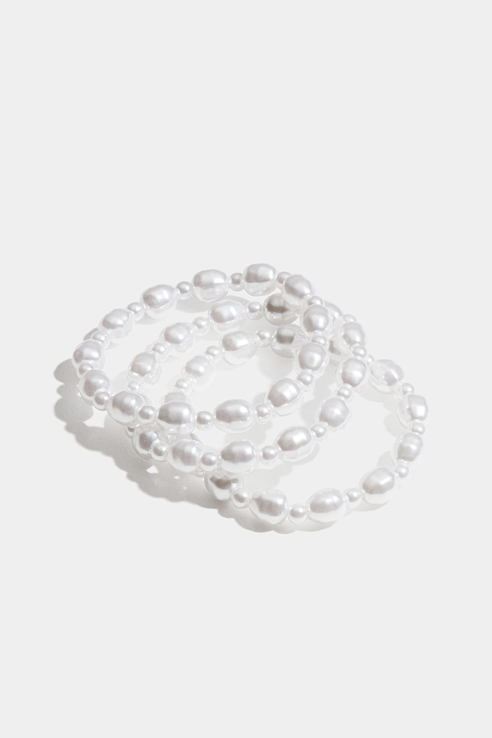 Elastiske armbånd med hvite perler, 3-pakning