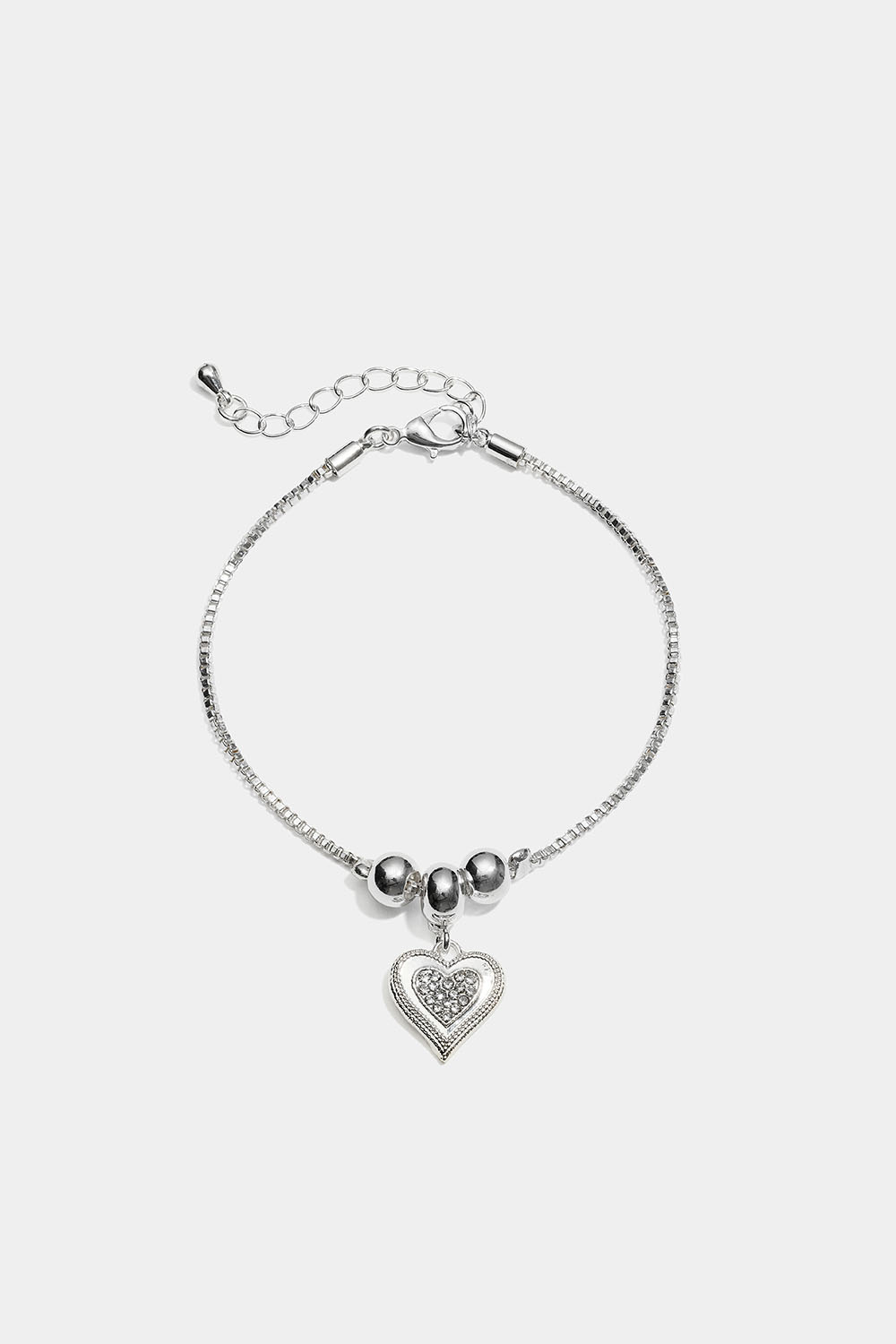 Armbånd med hjerteformet anheng